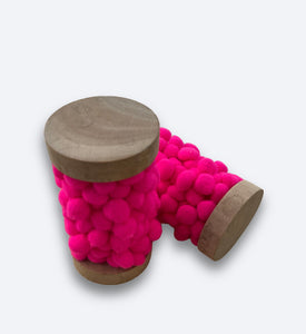 Neon Pink Pom Pom Ribbon on Wooden Spool